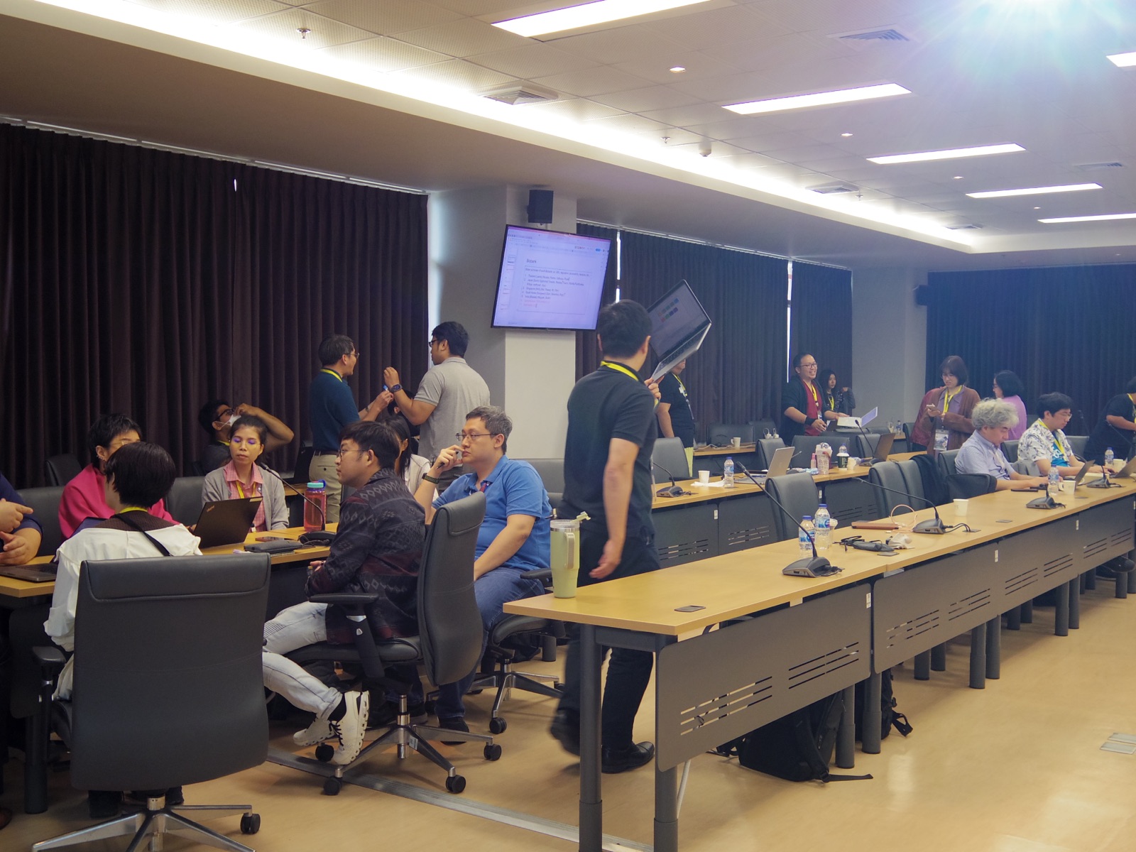 Participants working together during a hacking session